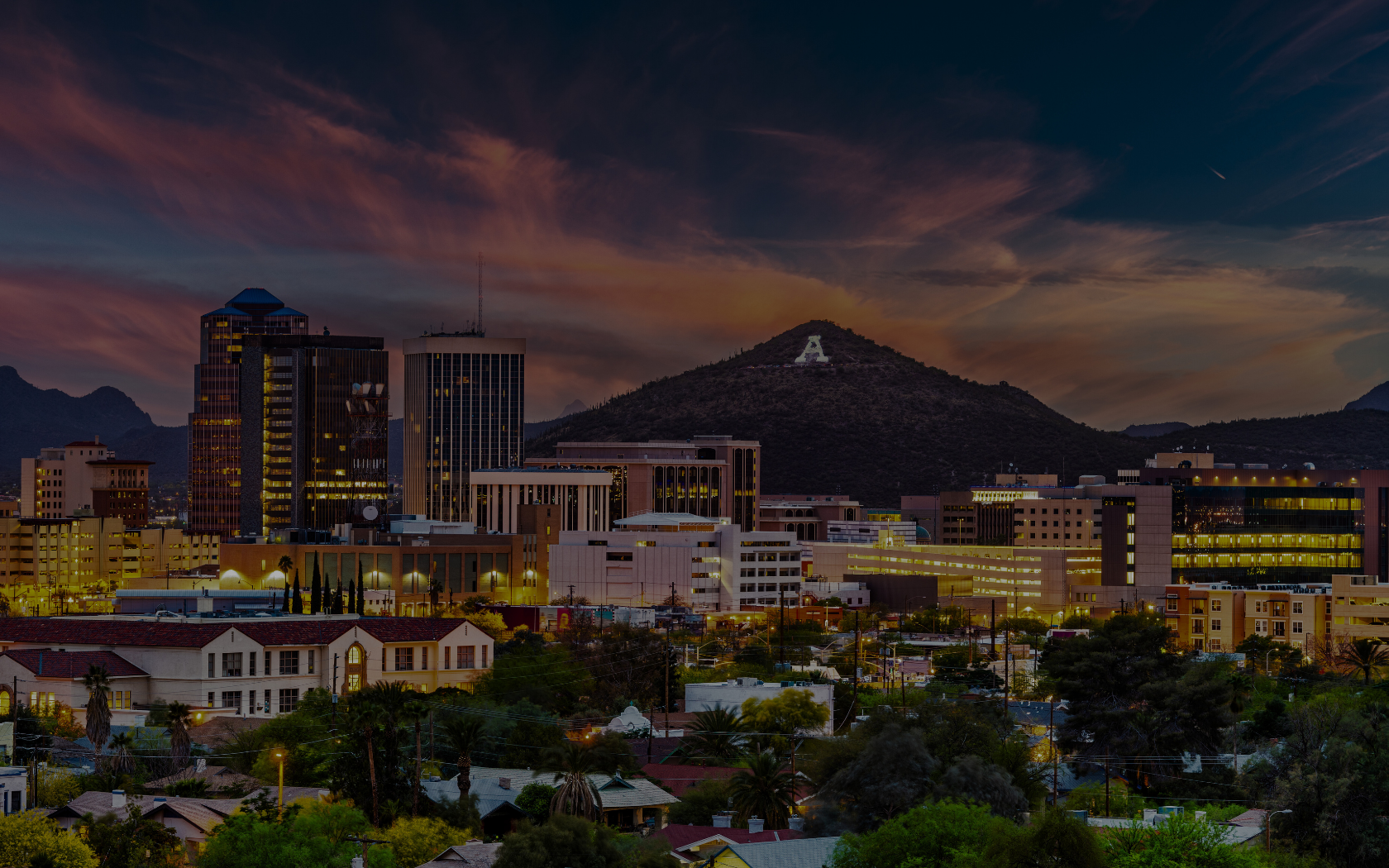 Downtown Tucson and A Mountain at dusk